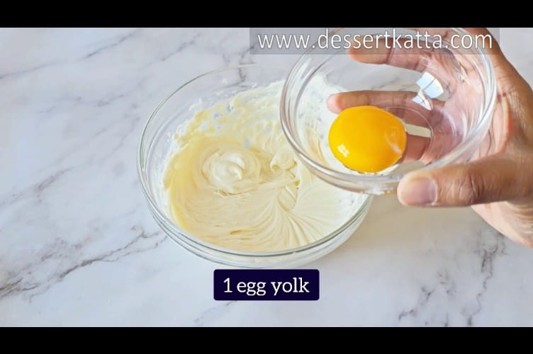 adding 1 egg yolk into New York cheesecake filling