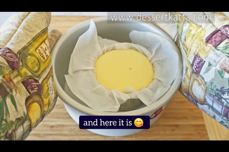 placing baked New York cheesecake on wooden board
