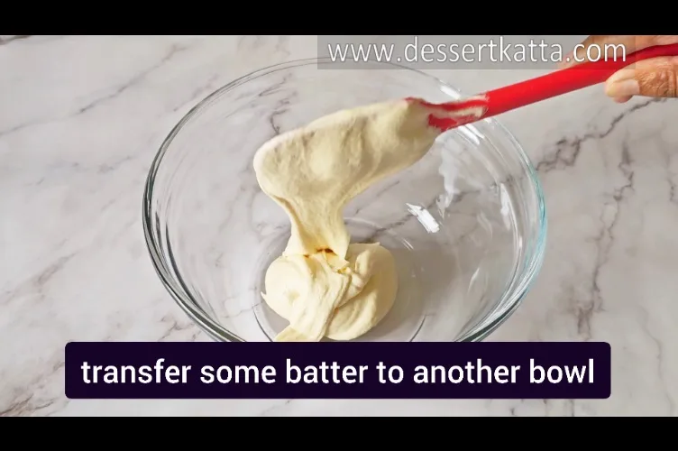 transferring some batter to other bowl to make red velvet cake batter
