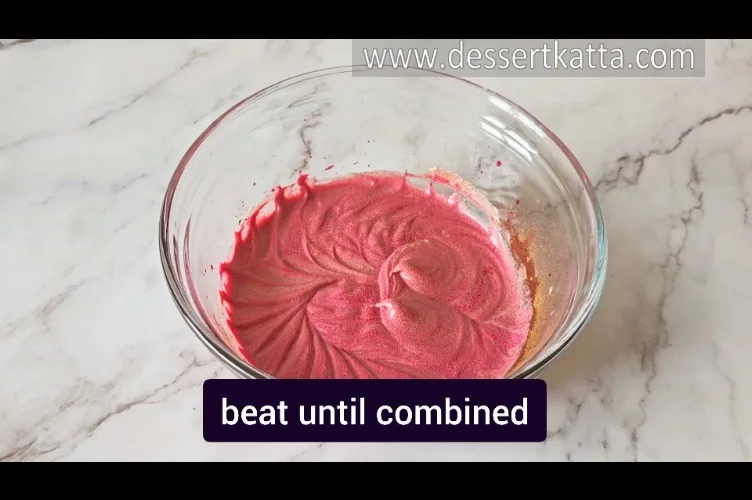 beating the batter to make red velvet cake batter