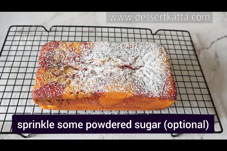 dusting the Starbucks red velvet loaf with powdered sugar