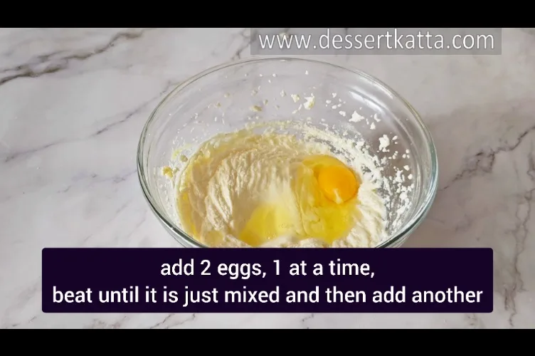 adding eggs into butter sugar mixture