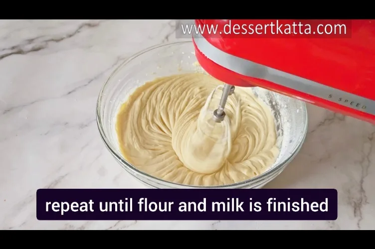 beating cake batter by alternating flour and milk