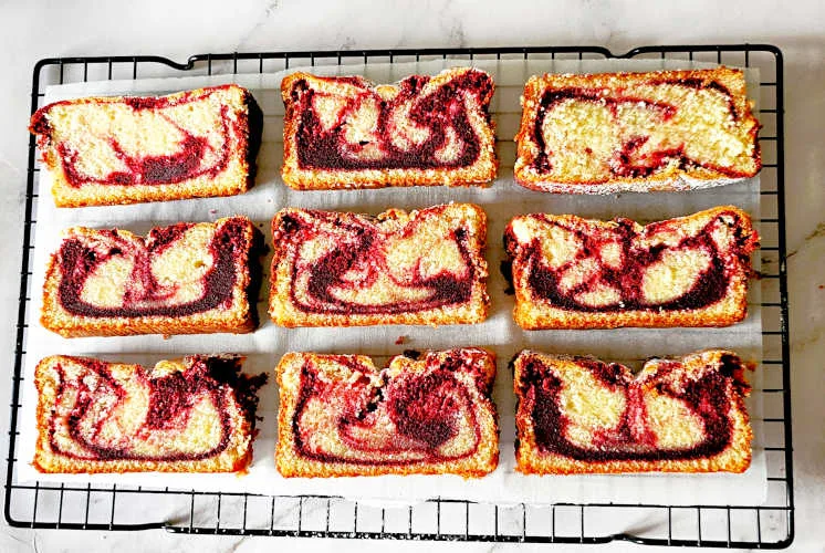 Starbucks red velvet loaf slices placed on wire rack