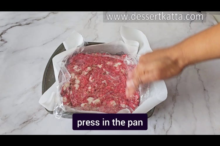 pressing Starbucks rice krispy treat mixture in the pan