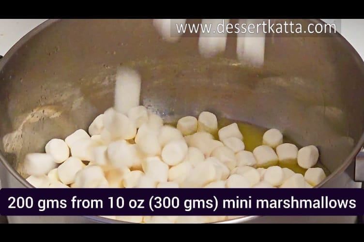 adding 200 grams of marshmallows to melted butter