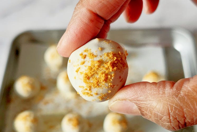 single biscoff truffle showing garnishing