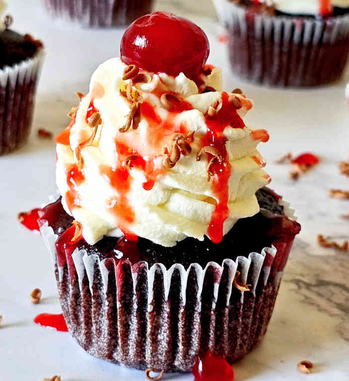 Black Forest Cupcakes Image and recipe by Sayali Bhave. Copyright : www.dessertkatta.com