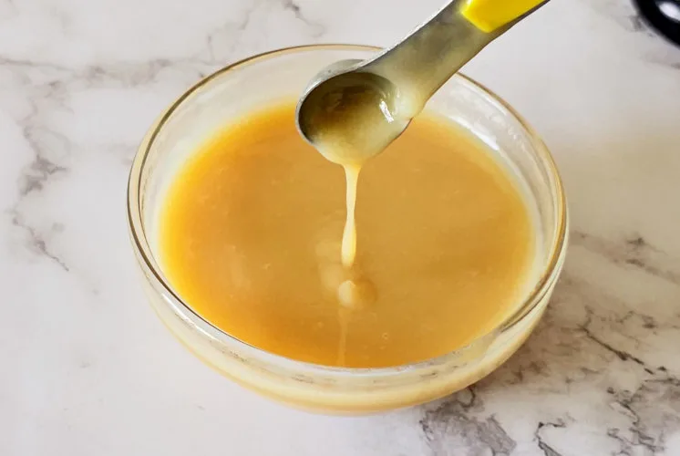 vanilla sauce placed in a glass bowl