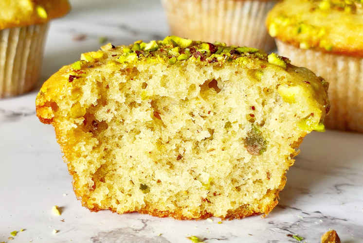 front shot of inside texture of pistachio muffins